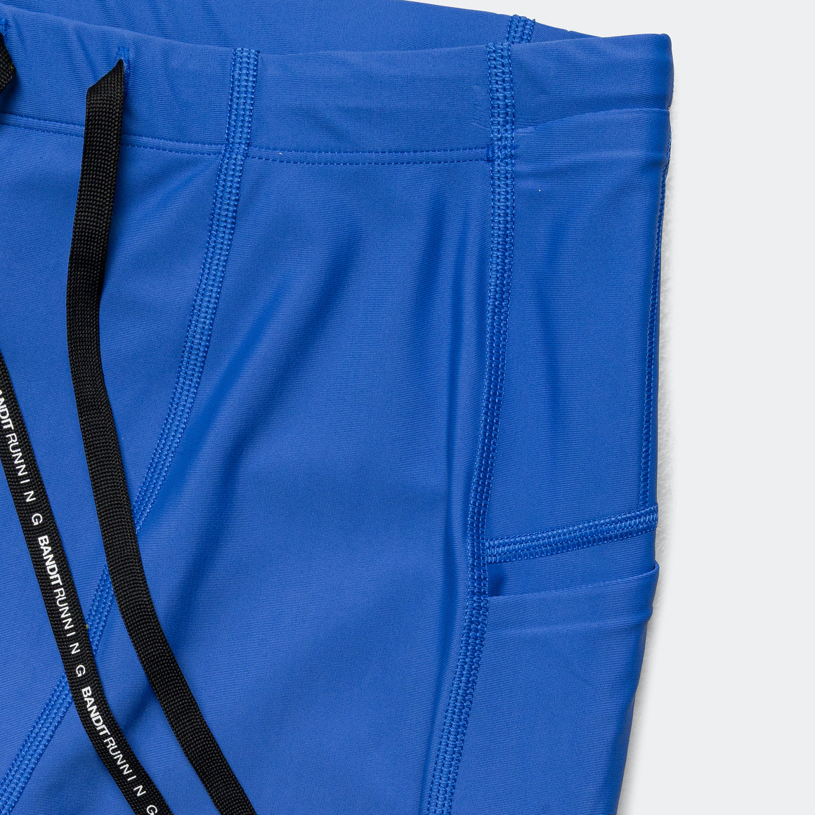 Bandit Running - Superbeam 7 Pocket Half Tights - Deep Peri Blue - Up There Athletics