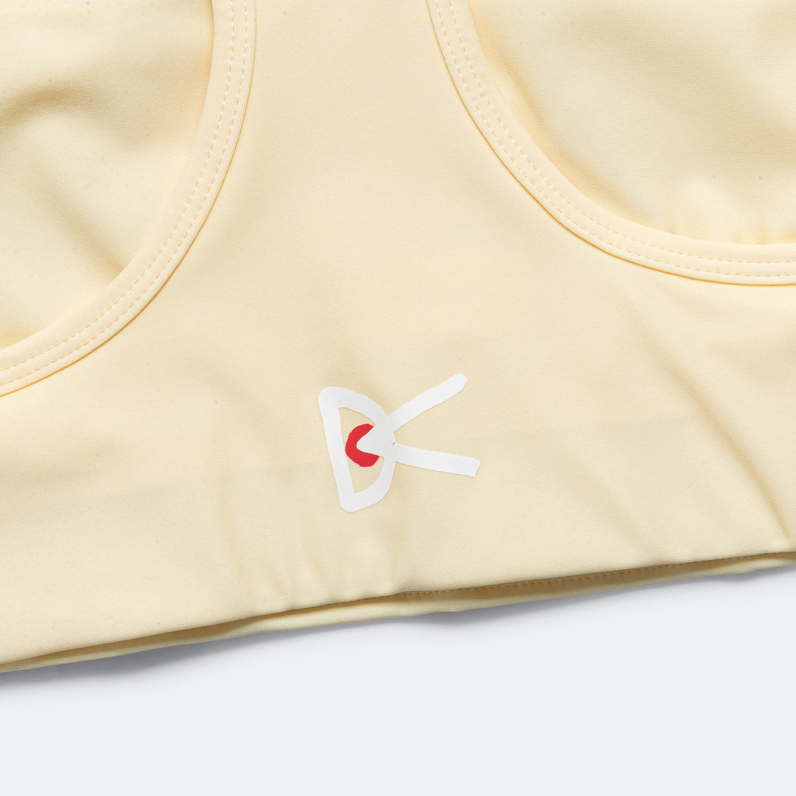 District Vision - Womens Twin Layer Medium Support Bra - Chamomile - Up There Athletics