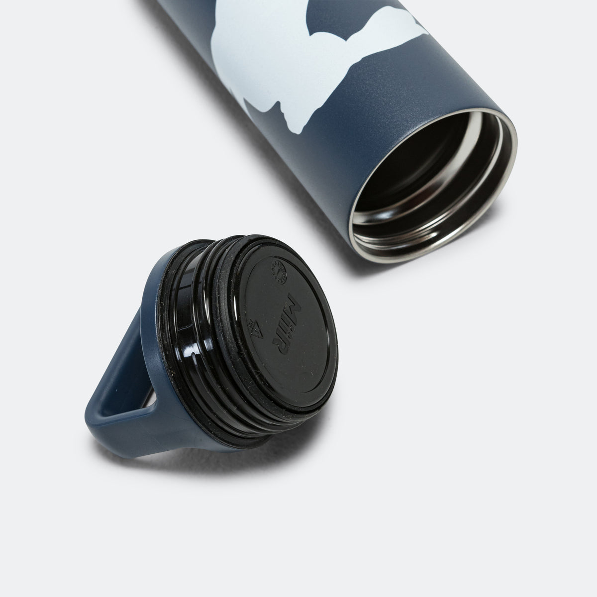 http://upthereathletics.com/cdn/shop/files/tracksmith-running-water-bottle-3_1200x1200.jpg?v=1686618006