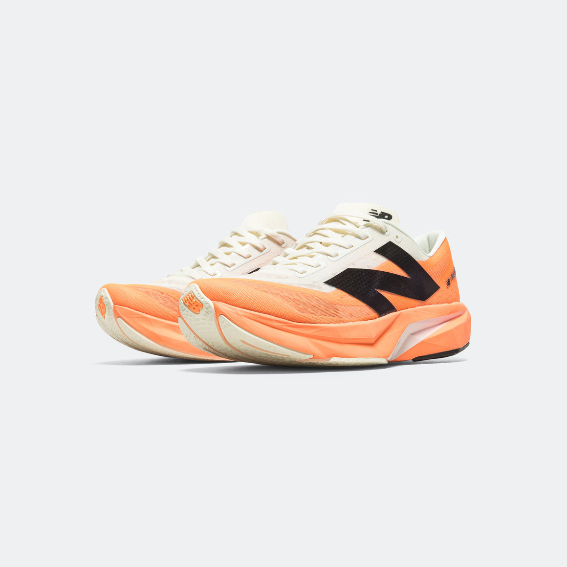 New Balance - Mens FuelCell Rebel v4 - Hot Mango/Angora-Black - Up There Athletics