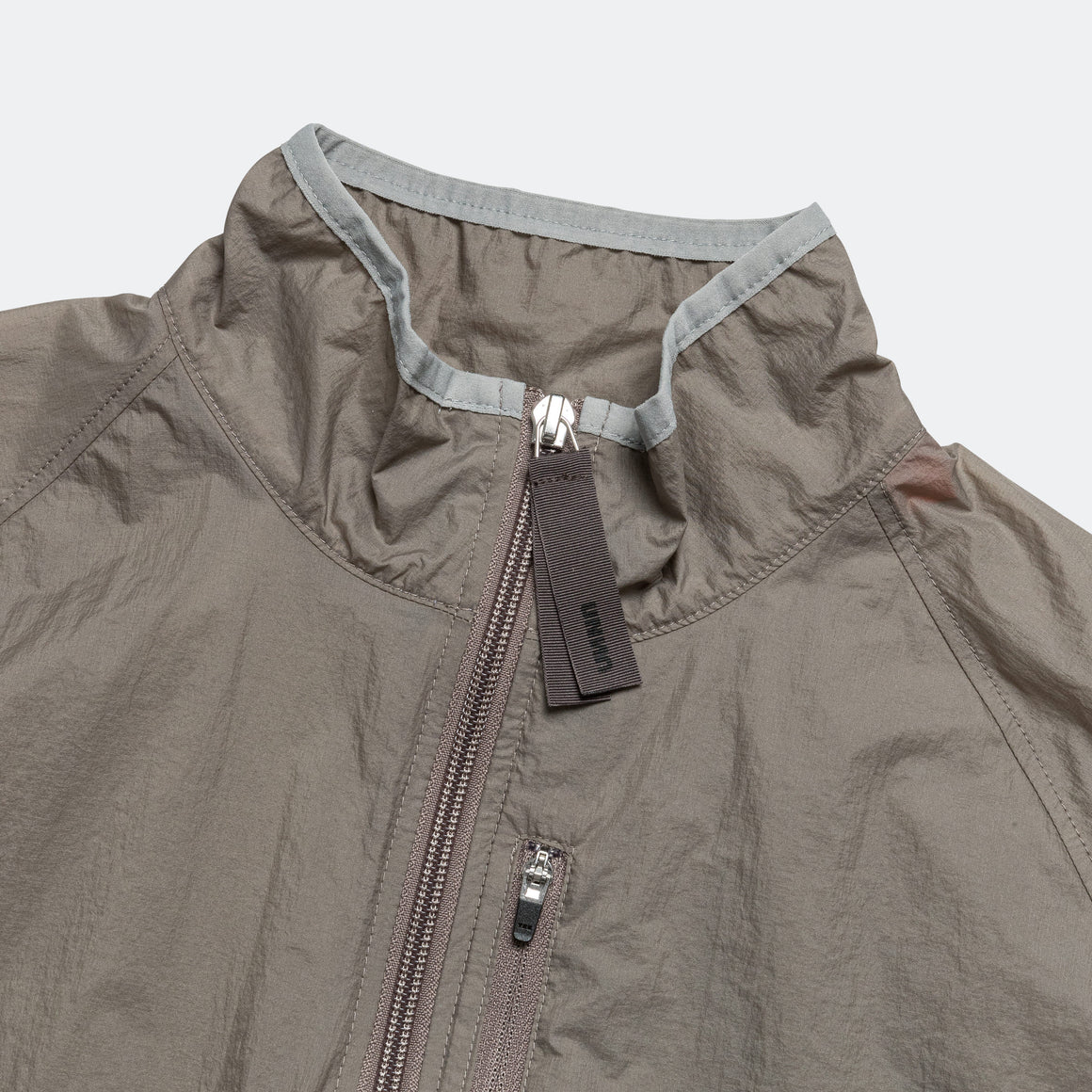 UNNA - Smiles Windstopper - Stone Grey - Up There Athletics